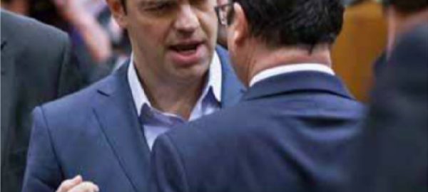 French President François Hollande speaks with Alexis Tsipras during the leaders summit in Brussels